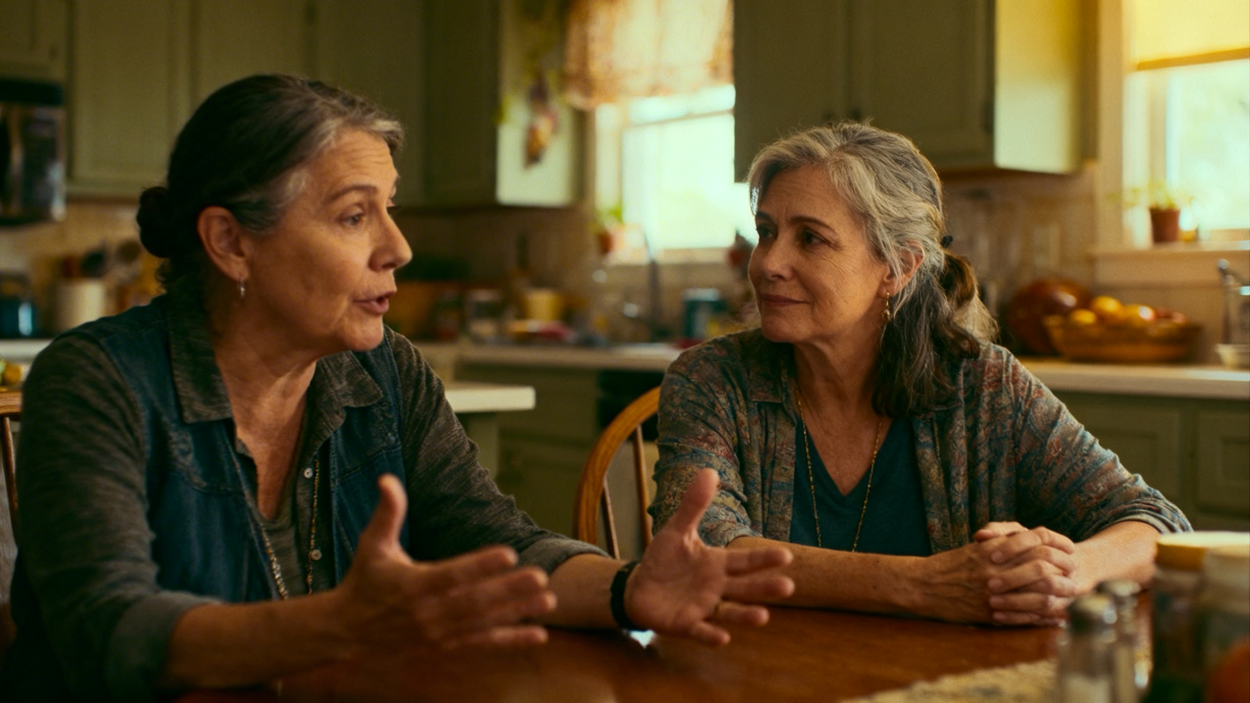 Two women talking over coffee